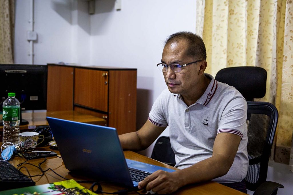 City FM general manager U Ye Naing Soe at his office in Yangon on June 9. (Hkun Lat | Frontier)