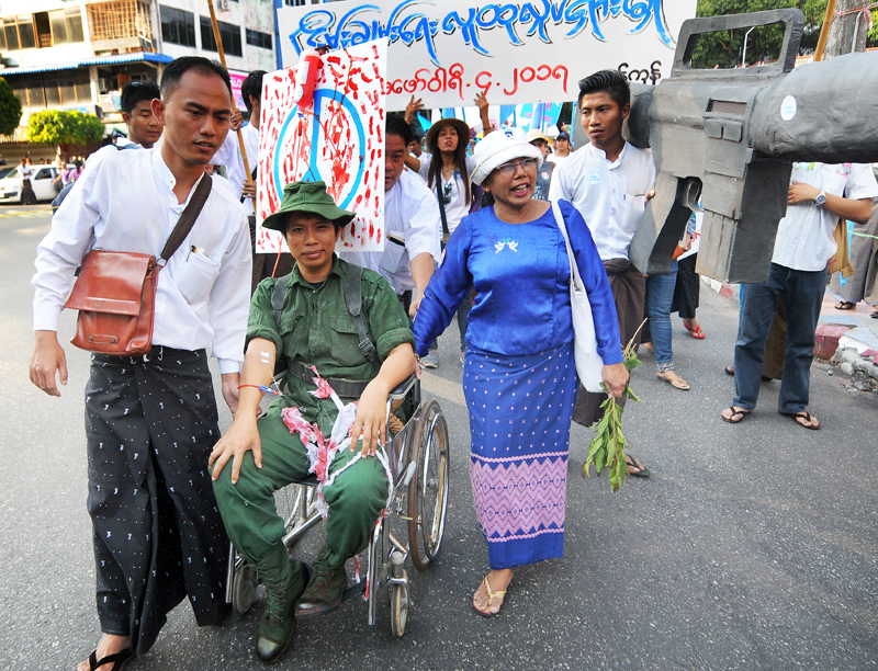 Activists gather in Yangon's Mahabandoola Park for a peace march in February 2017. (Steve Tickner | Frontier)
