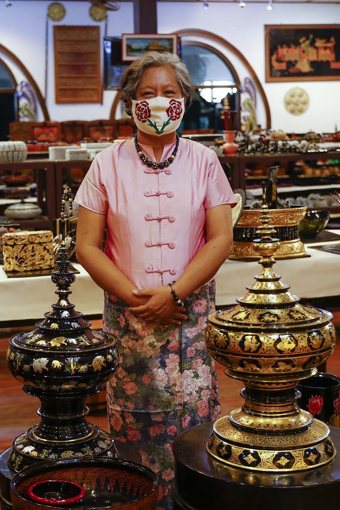 Daw Maw Maw Aung, the owner of Bagan House Lacquerware, which has switched to producing face masks that are sold on Facebook. (Nyein Su Wai Kyaw Soe | Frontier)