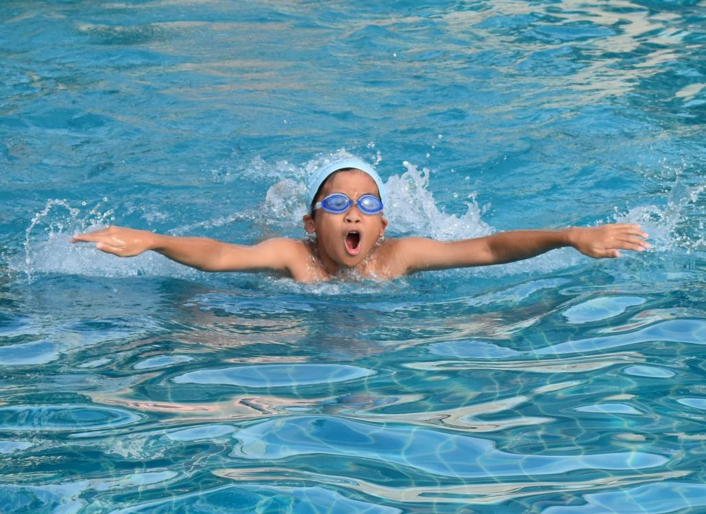 A Dulwich College Yangon student swims at the Star City campus