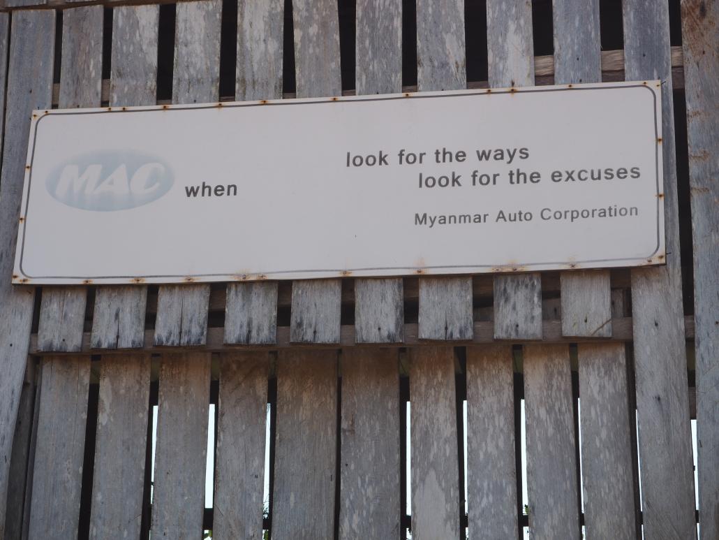 On a shed within the MAC oil palm concession in Bokpyin Township is a sign bearing an apt message. (Ben Dunant | Frontier)