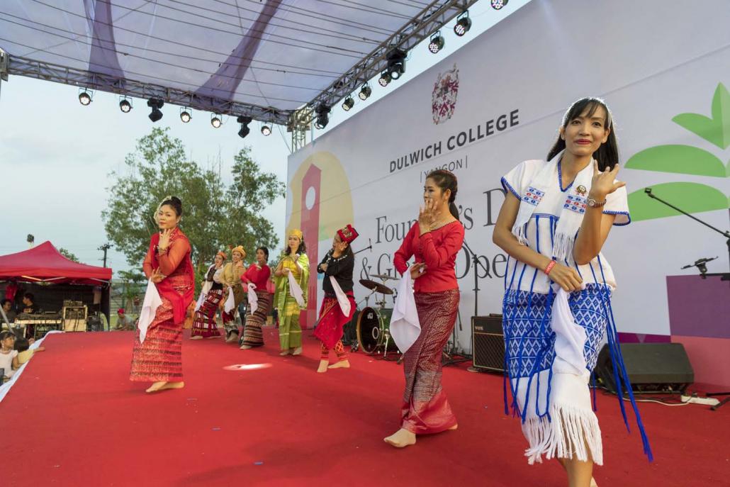 Parents perform a traditional dance at Dulwich College Yangon's Founder's Day event.