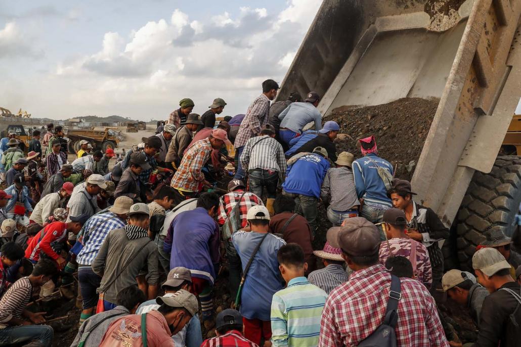 Freelance jade pickers sift through mining waste in Hwekha. (Nyein Su Wai Kyaw Soe | Frontier)