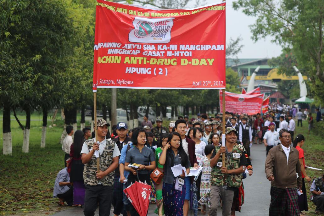 People march against the drug scourge at the Kachin National Manau Park in Myitkyina. (Supplied)