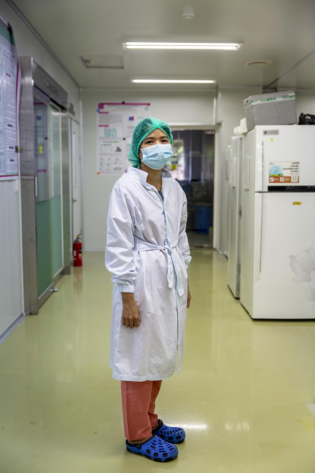 Research scientist Daw Hnin Ohnmar Swe and other laboratory staff at the Department of Medical Research have been working every day since the department began testing for COVID-19 on April 23. (Hkun Lat | Frontier)