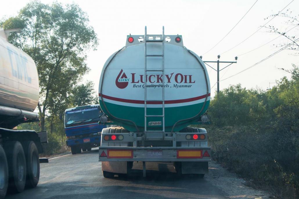 Tankers on the two-lane road that runs behind fuel terminals at Thilawa. (Thuya Zaw | Frontier)