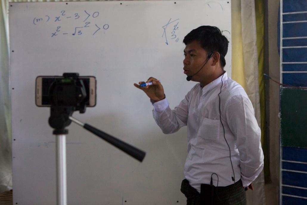 A teacher at Grindstone private school in Yangon’s Htantabin Township conducts a class over Zoom, a videoconferencing software that has enabled classes to continue remotely using the internet. (Thuya Zaw | Frontier)