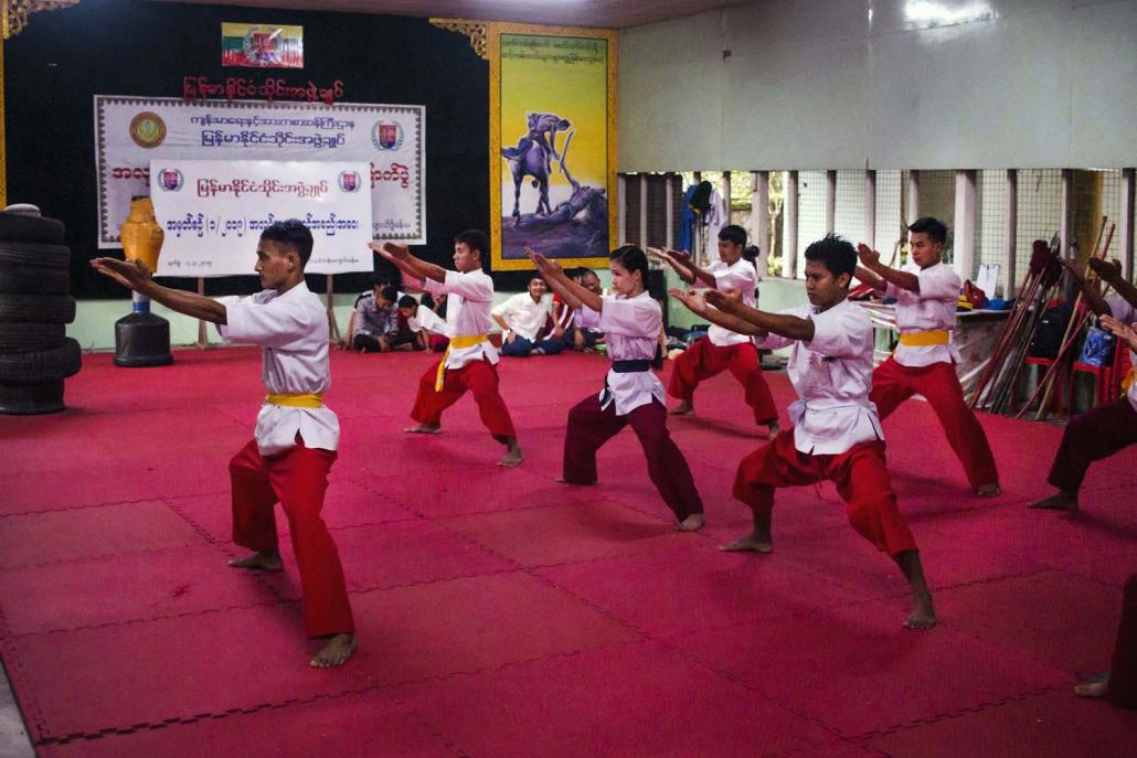 Thaing students train with a sword. Veteran thaing practitioners want it to be taught in schools across the country as part of the national curriculum. (Thuya Zaw | Frontier)