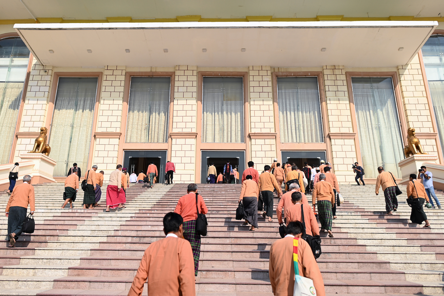 Members of Myanmar's parliament arrive for a session at the Pyidaungsu Hluttaw in Nay Pyi Taw on March 10, 2020. (AFP)