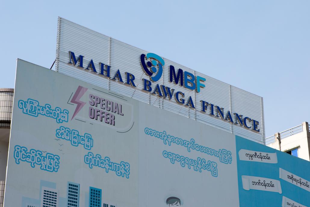 In addition to 193 licensed microfinance institutions, Myanmar also has 29 non-bank financial institutions. Some of these NBFIs, like Mahar Bawga Finance, A1 Capital and Mother Finance, lend like an MFI but at a higher interest rate. (Thuya Zaw | Frontier)