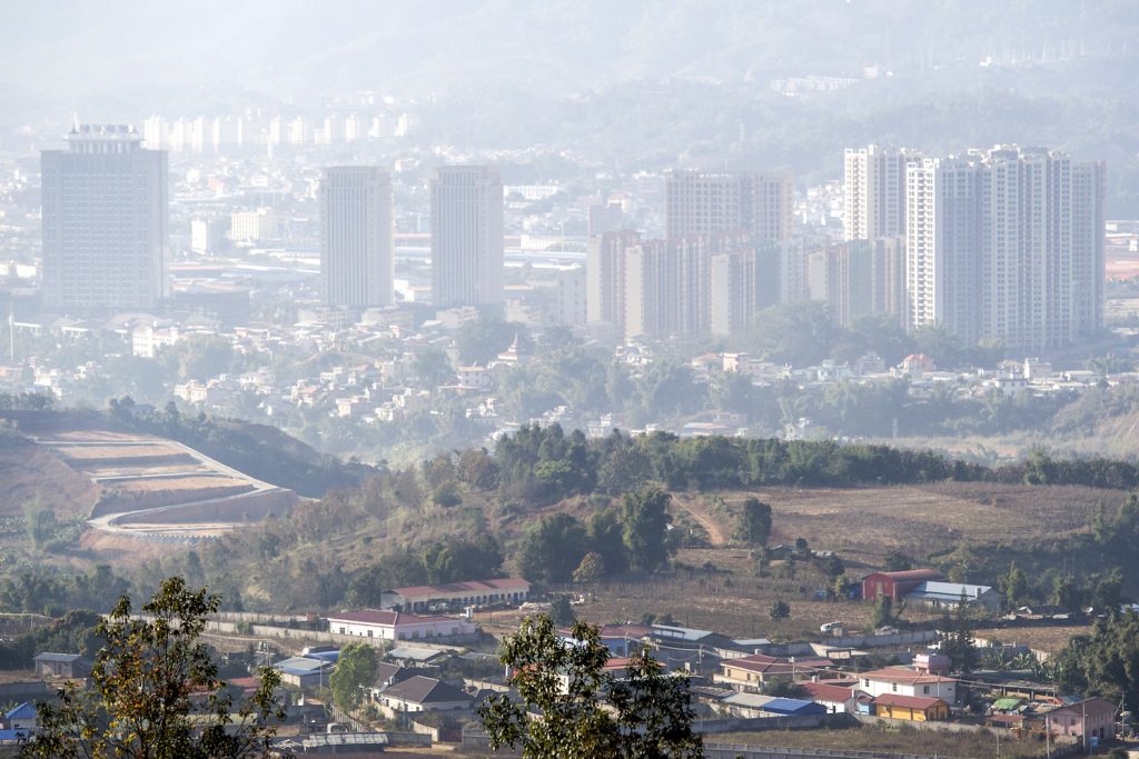 This photo taken on January 11, 2019 shows a general view of the town of Muse (foreground) and Ruili in China (background), as seen from Myanmar's border town of Muse in Shan state. (AFP)