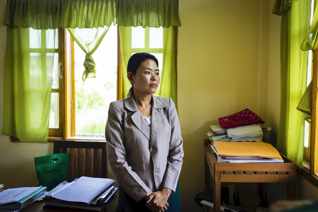 Daw Thida Khaing, 36, secretary of the Mrauk-U Township election sub-commission, at her office in Mrauk-U on August 21. (Hkun Lat | Frontier)