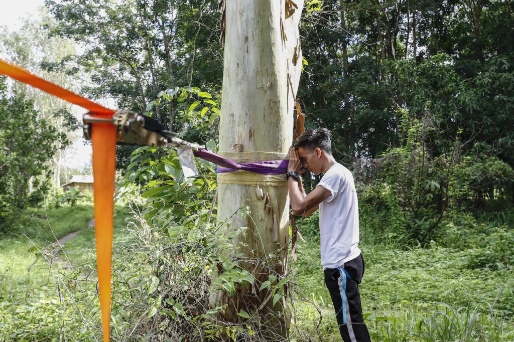 Slackline community etiquette involves great respect for the trees used in the sport, including the use of gear to protect bark from the slackline itself. (Nyein Su Wai Kyaw Soe | Frontier)