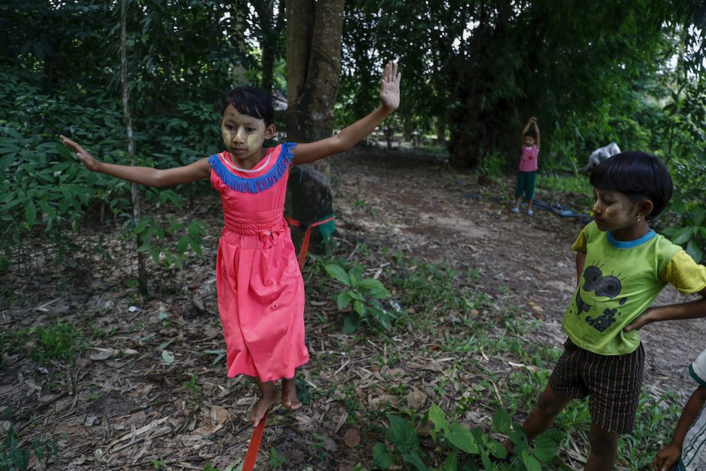 A child attempts to slackline. (Nyein Su Wai Kyaw Soe | Frontier)