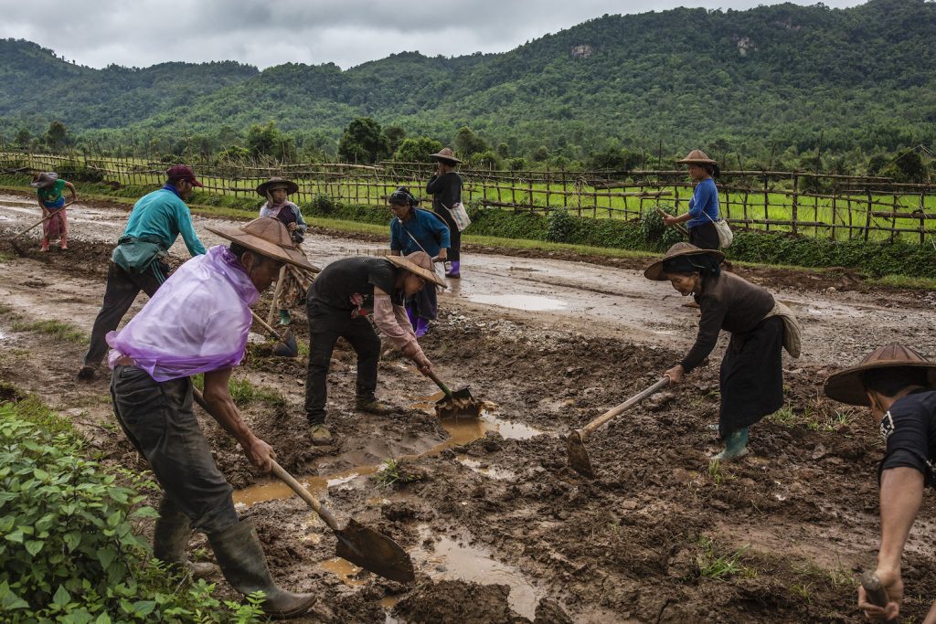 Ta’ang IDPs work on a village road construction project in Kutkai Township to earn some income. (Hkun Lat | Frontier)