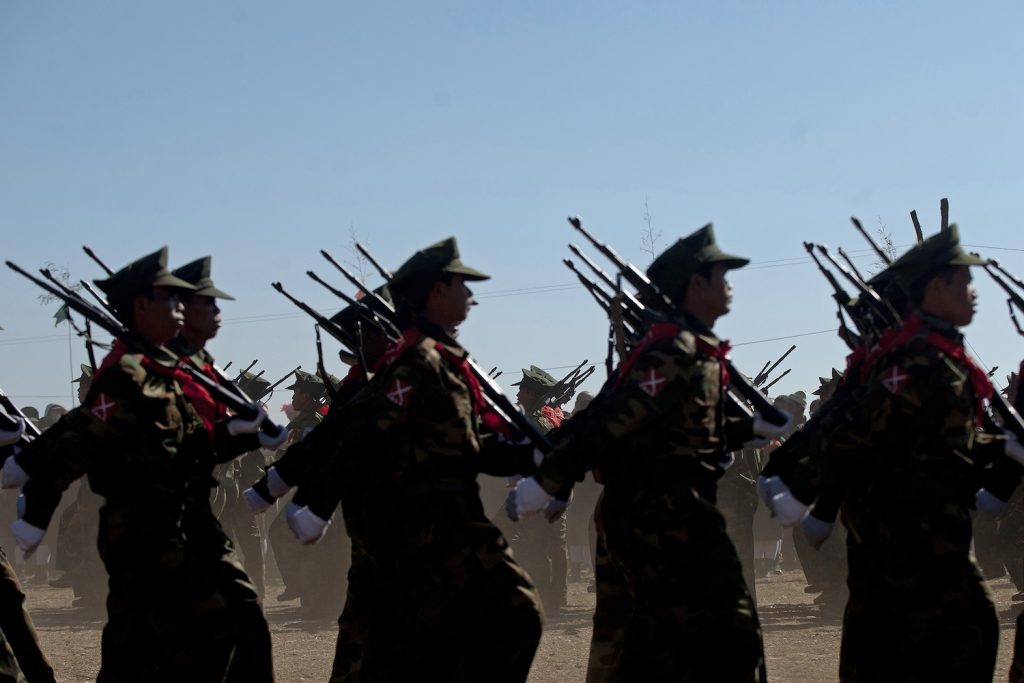 Soldiers from the Ta’ang National Liberation Army parade to mark the 51st anniversary of the Ta’ang National Resistance Day at Homain, Nansang township, Shan State in January 2014. (AFP) 