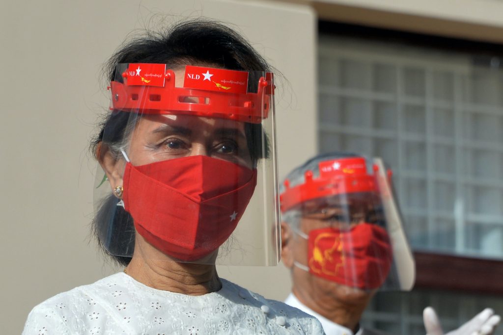 State counselor Daw Aung San Suu Kyi attends a flag-raising ceremony for her ruling National League for Democracy in Nay Pyi Taw on September 8, the day campaigning for the November election officially began. (AFP)