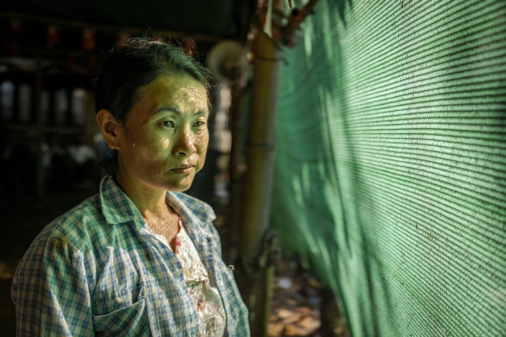 Hlegu Township resident Daw Khin Thet Maw she did not initially understand that she would be asked to repeat the false confession in front of police, or that the USDP members would name her as a witness when they filed an official complaint with police accusing the NLD of vote buying. (Hkun Lat | Frontier)