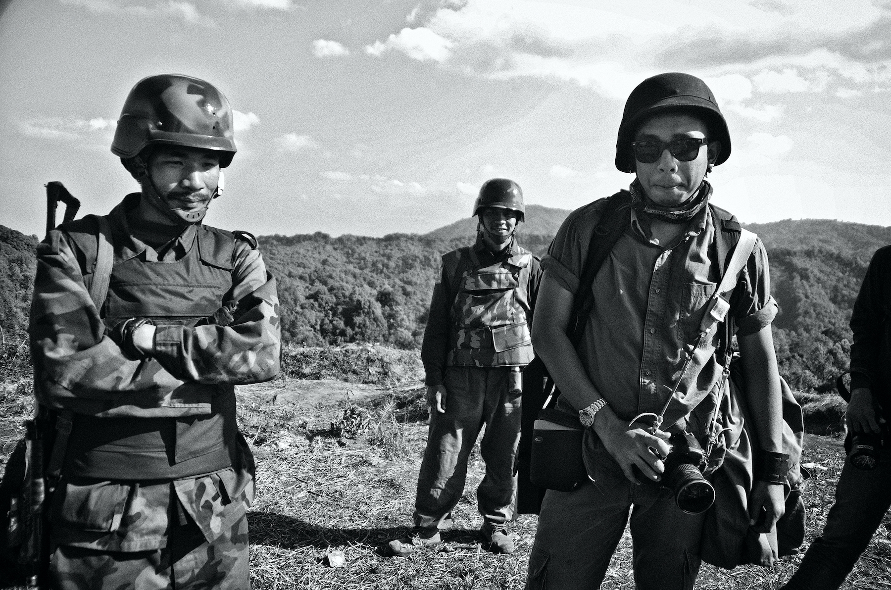 Ko Kaung Htet, right, on a reporting trip with the Restoration Council of Shan State in 2016. (Sai Zaw Theik)