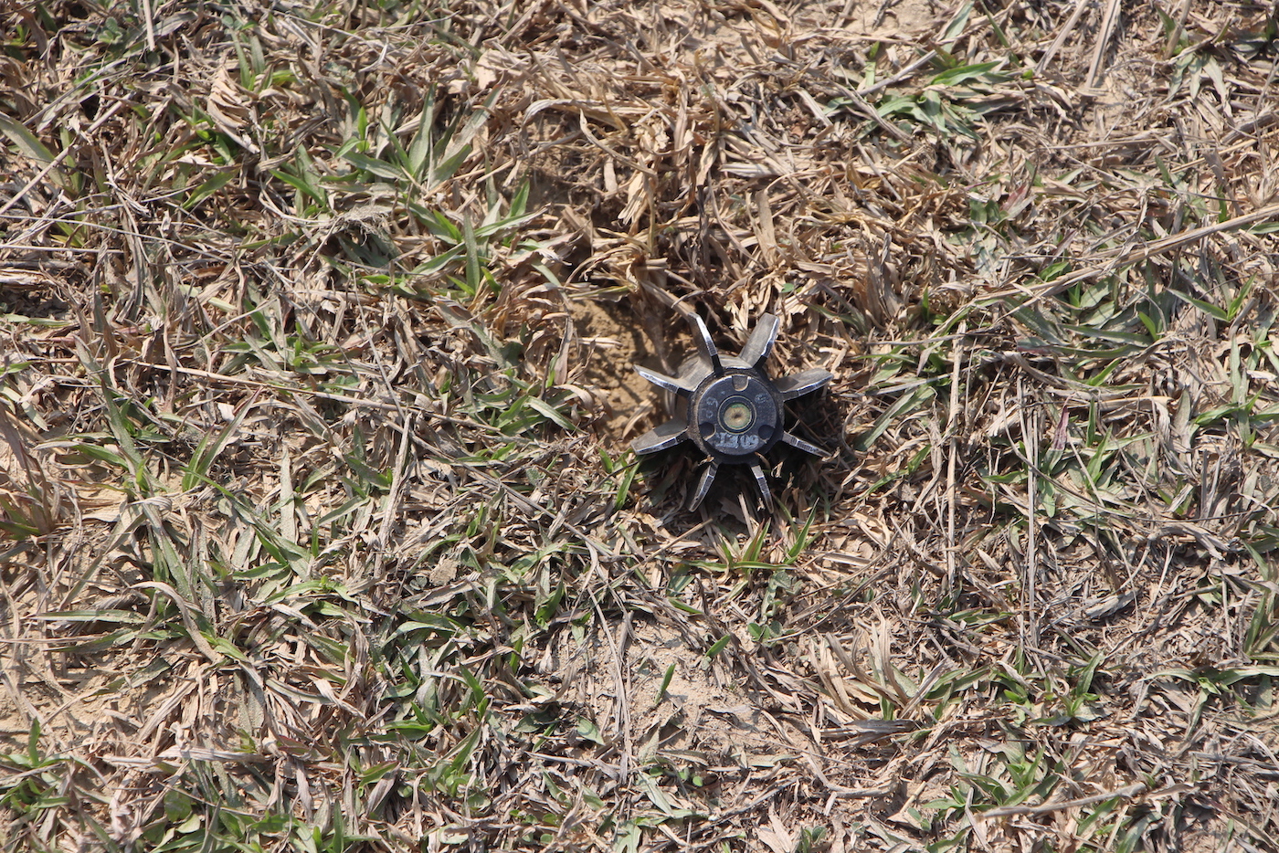 An unexploded ordnance is seen in Buthidaung Township's Si Taung village in April 2019.