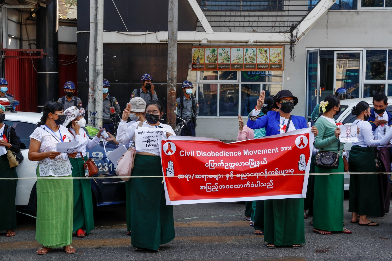 Striking government schoolteachers from Yangon's North Okkalapa Township demonstrate their opposition to the coup on February 9, 2021. (Frontier)