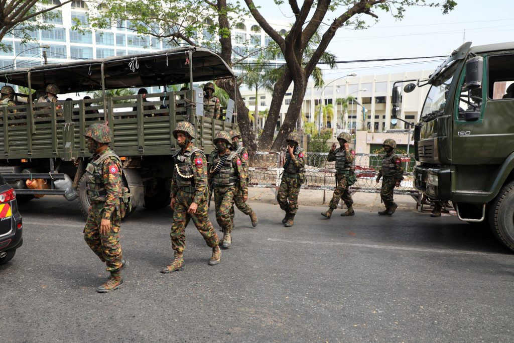 Soldiers from the 77th Light Infantry Division outside the Central Bank of Myanmar on February 15. (Frontier)