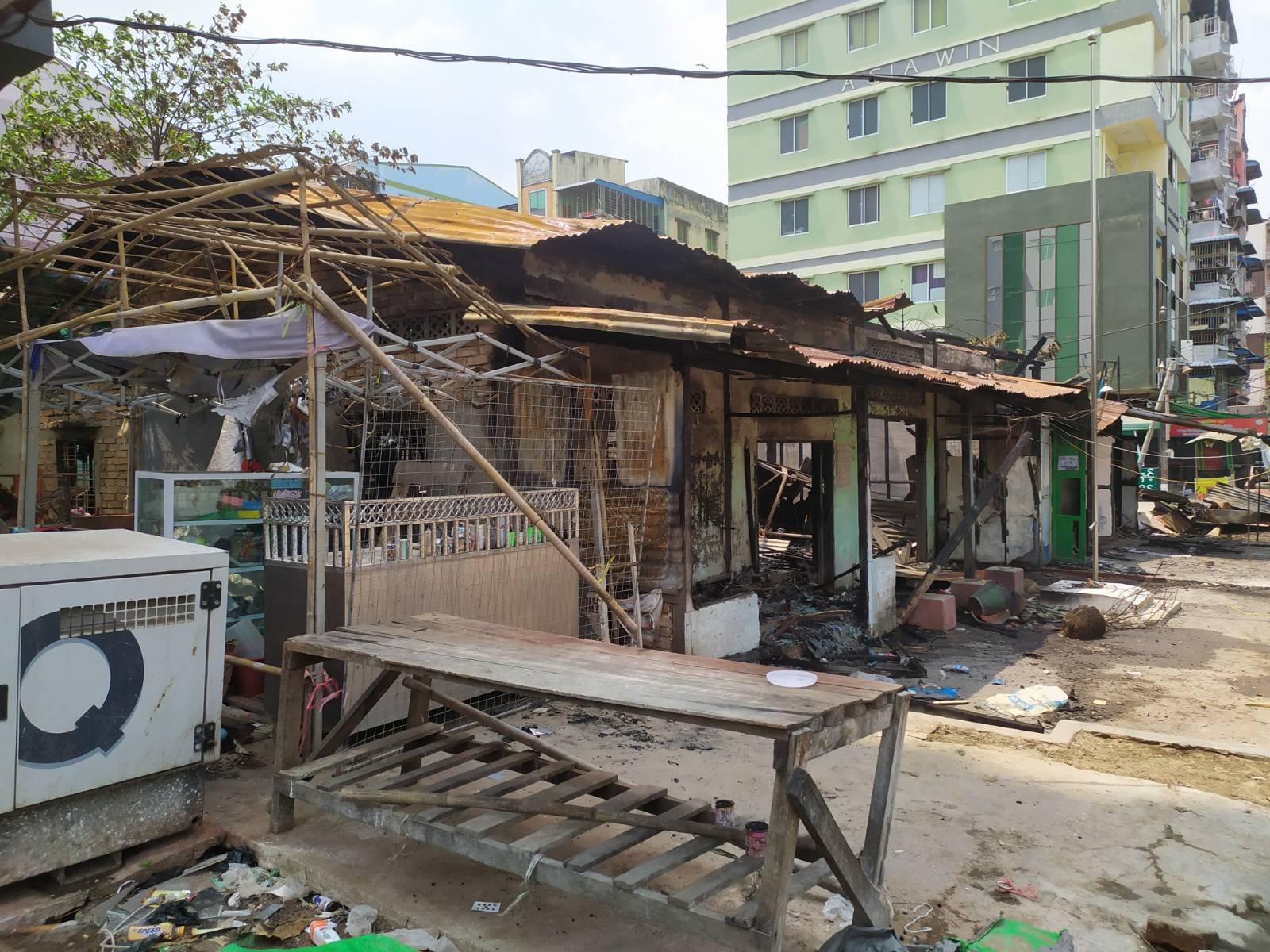 A row of burned-out buildings in Yangon's Dawbon Township, including a ward administration office. (Frontier)