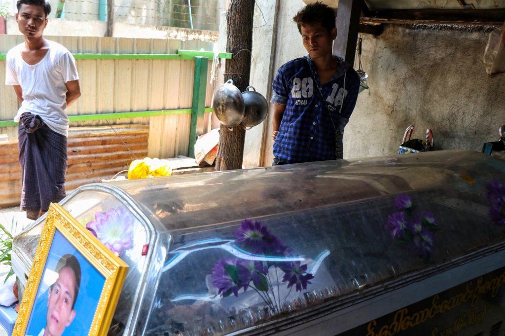 The coffin of U Zaw Shine, a tea shop stallholder who died the day before after being shot in the chest during crackdown by security forces, is displayed in Mandalay on April 27. (AFP)