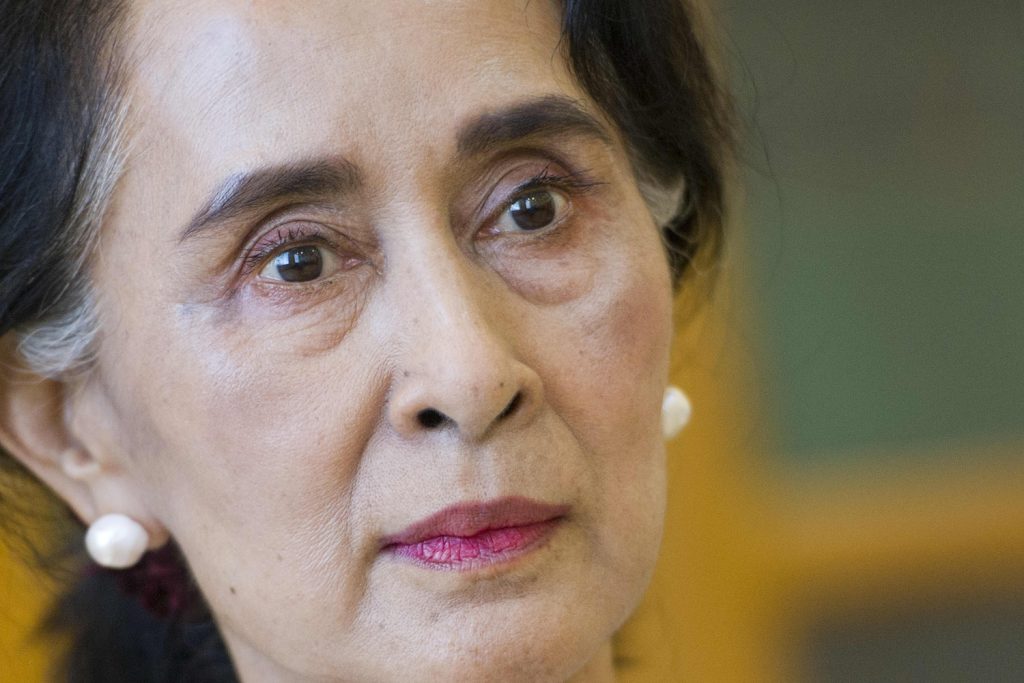 National League for Democracy chair Daw Aung San Suu Kyi listens during an interview at the parliament in Nay Pyi Taw on August 25, 2015. (AFP)