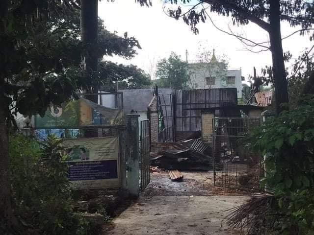 The charred remains of a South Dagon Township ward administration office are seen after residents burned the office down in defiance of the junta's attempt to install its own appointee.