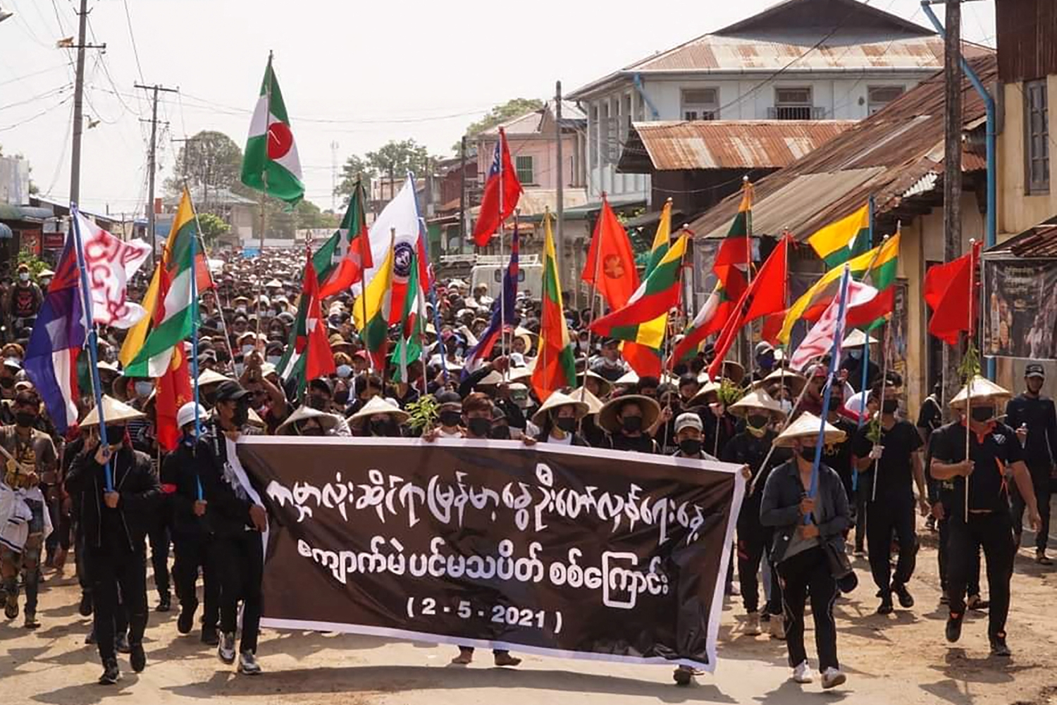 Protesters in Kyaukme, northern Shan State march for "Global Myanmar Spring Revolution Day" on May 2. (Shwe Phee Myay News Agency /AFP)