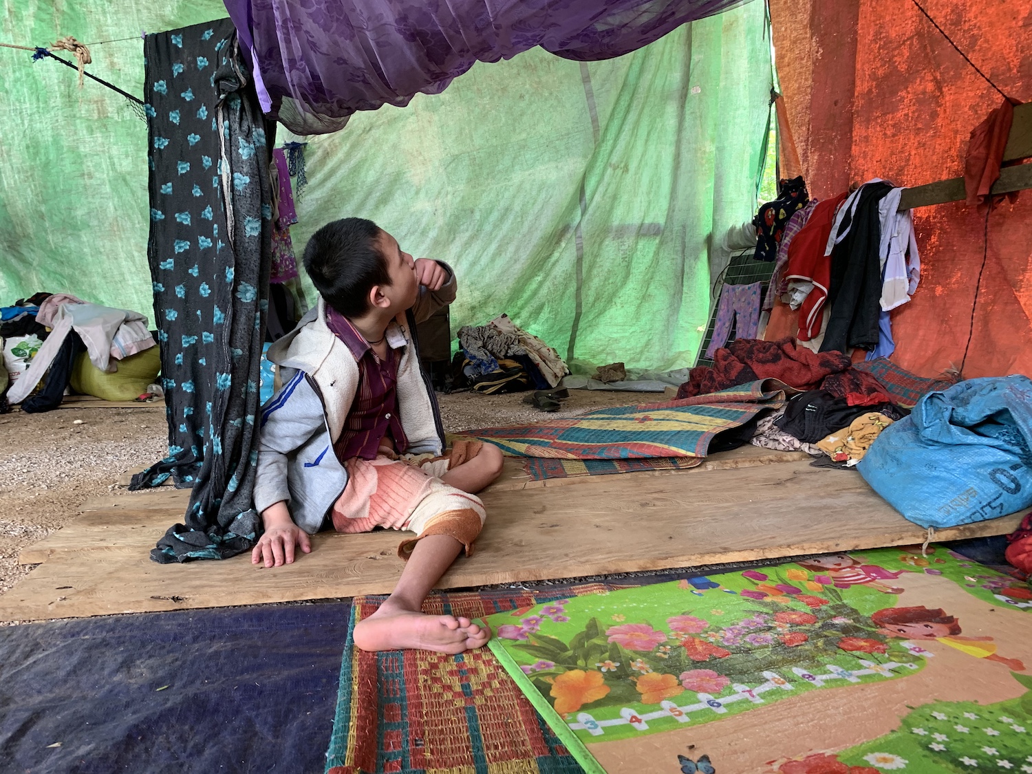 A 16-year-old disabled girl living in an IDP in Kayah State is left alone most days while her parents work. (Frontier)