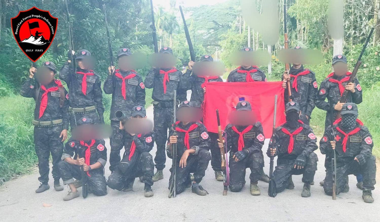 Members of the Dawei East Forest People's Defense Force pose in uniform. (Supplied)