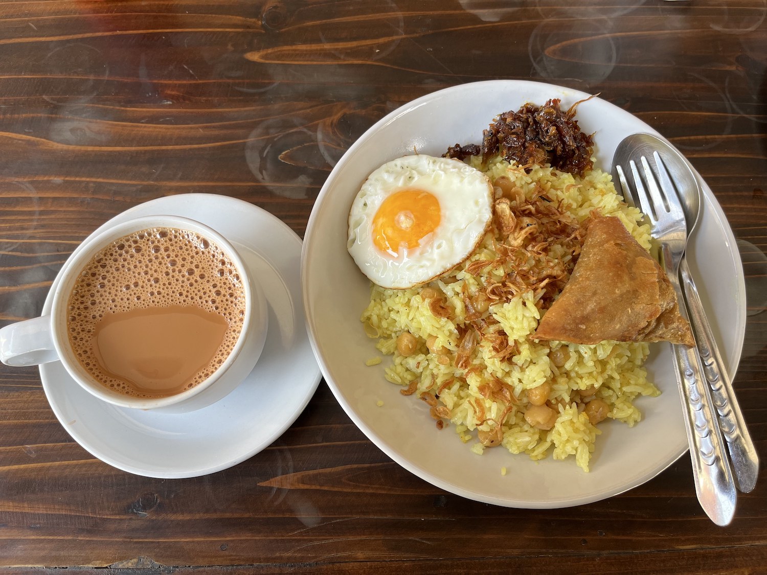 Myanmar tea and pe pyote htamin at Ko Zaw's tea shop. (Frontier)