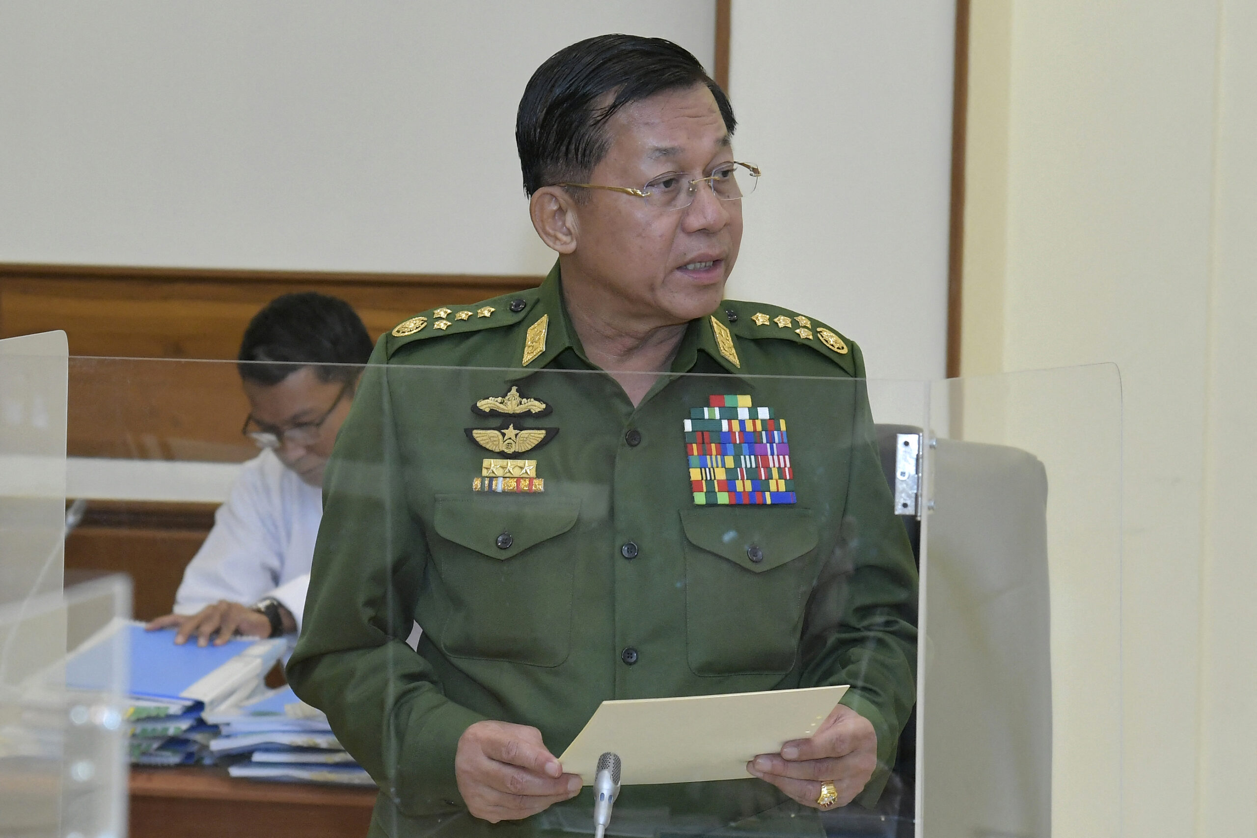 Senior General Min Aung Hlaing says he will extend the state of emergency during a Defence and Security Council meeting in Nay Pyi Taw. (AFP)