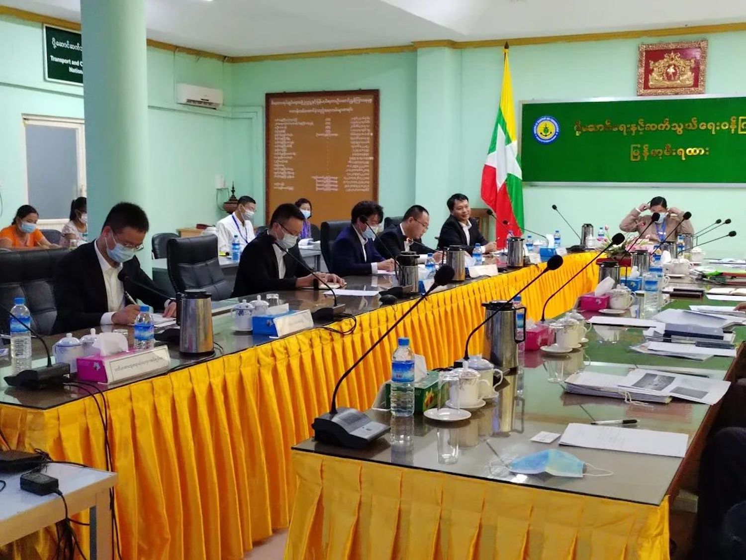 A photo shared on social media in September appears to show Chinese company officials discussing the railway project in a Myanma Railways office. (Weixin / WeChat)