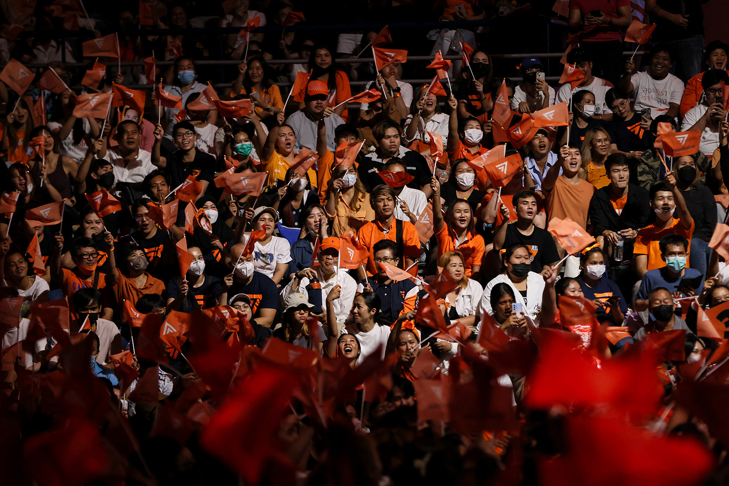 Supporters cheer during Move Forward Party's final campaign event in Bangkok on May 12, 2023. (AFP)