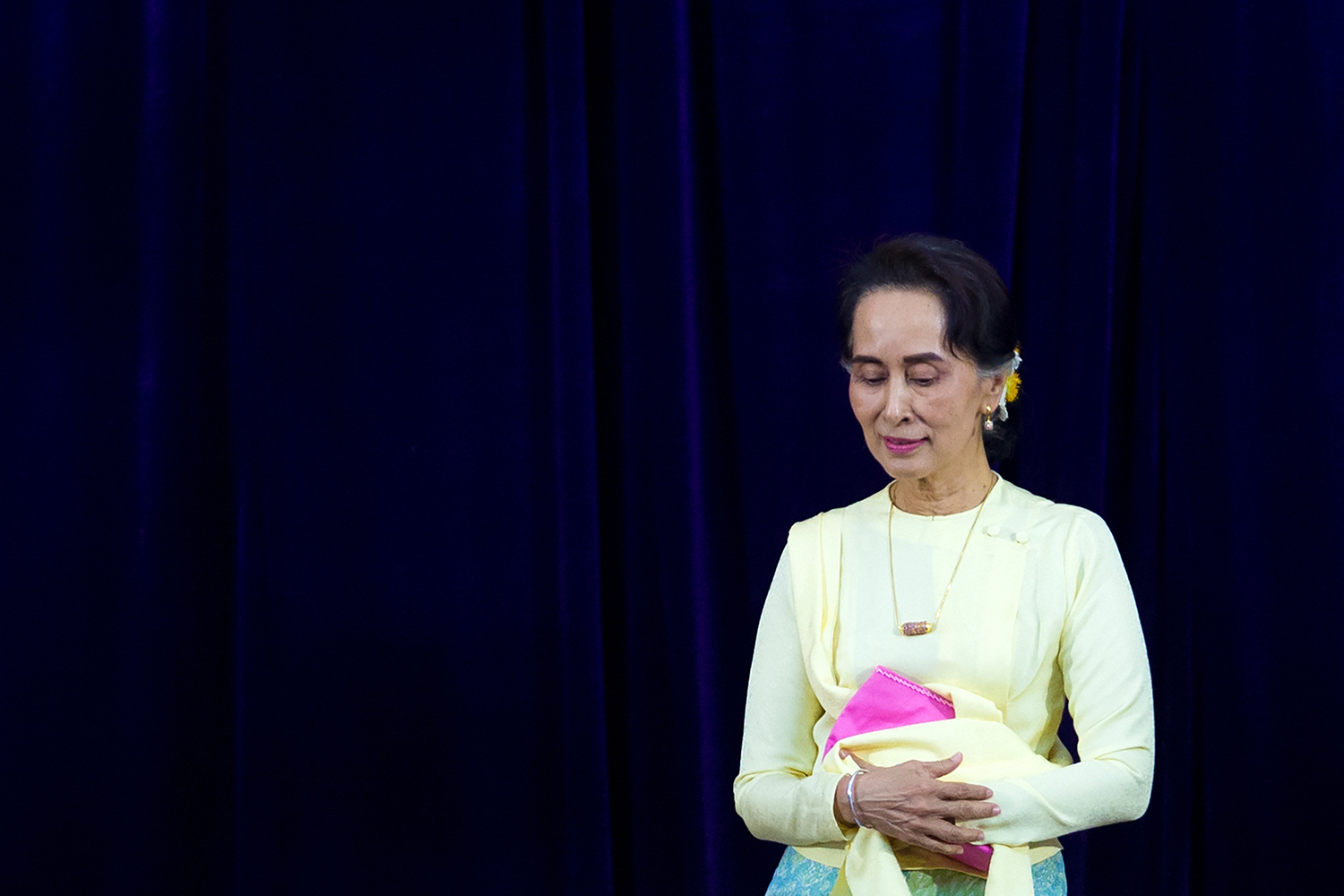 Aung San Suu Kyi leaves after delivering an address before Yangon University students on August 28, 2018. (AFP)