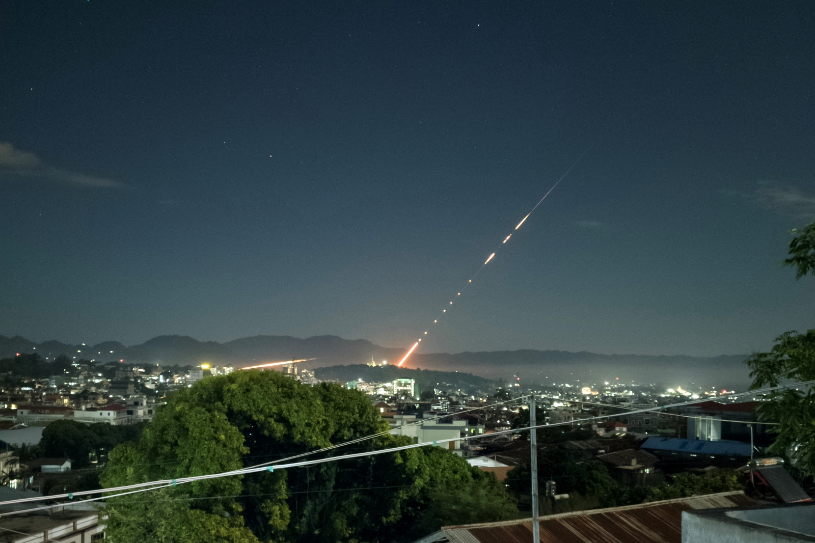 The Myanmar military fires a missile from a base in northern Shan State’s Lashio Township against MNDAA’s positions on October 28. (AFP)