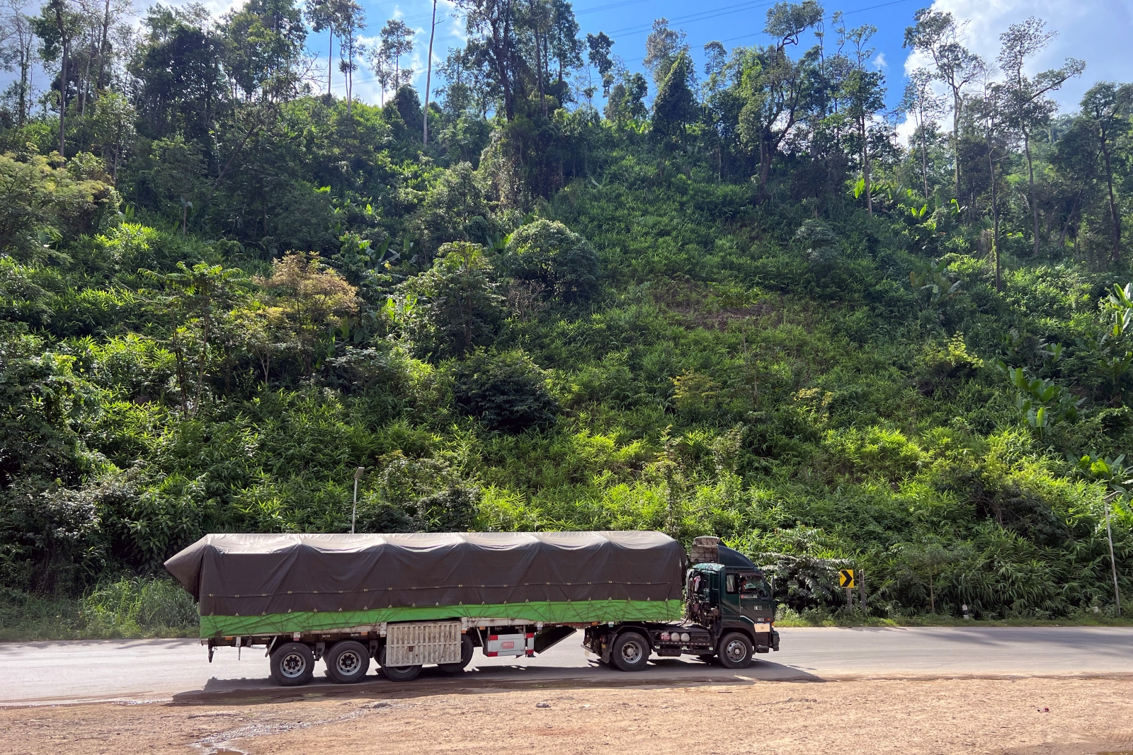 A truck drives on the Yangon-Myawaddy section of the Asia Highway near Kawkareik Township, in Kayin State, on September 24. (AFP)