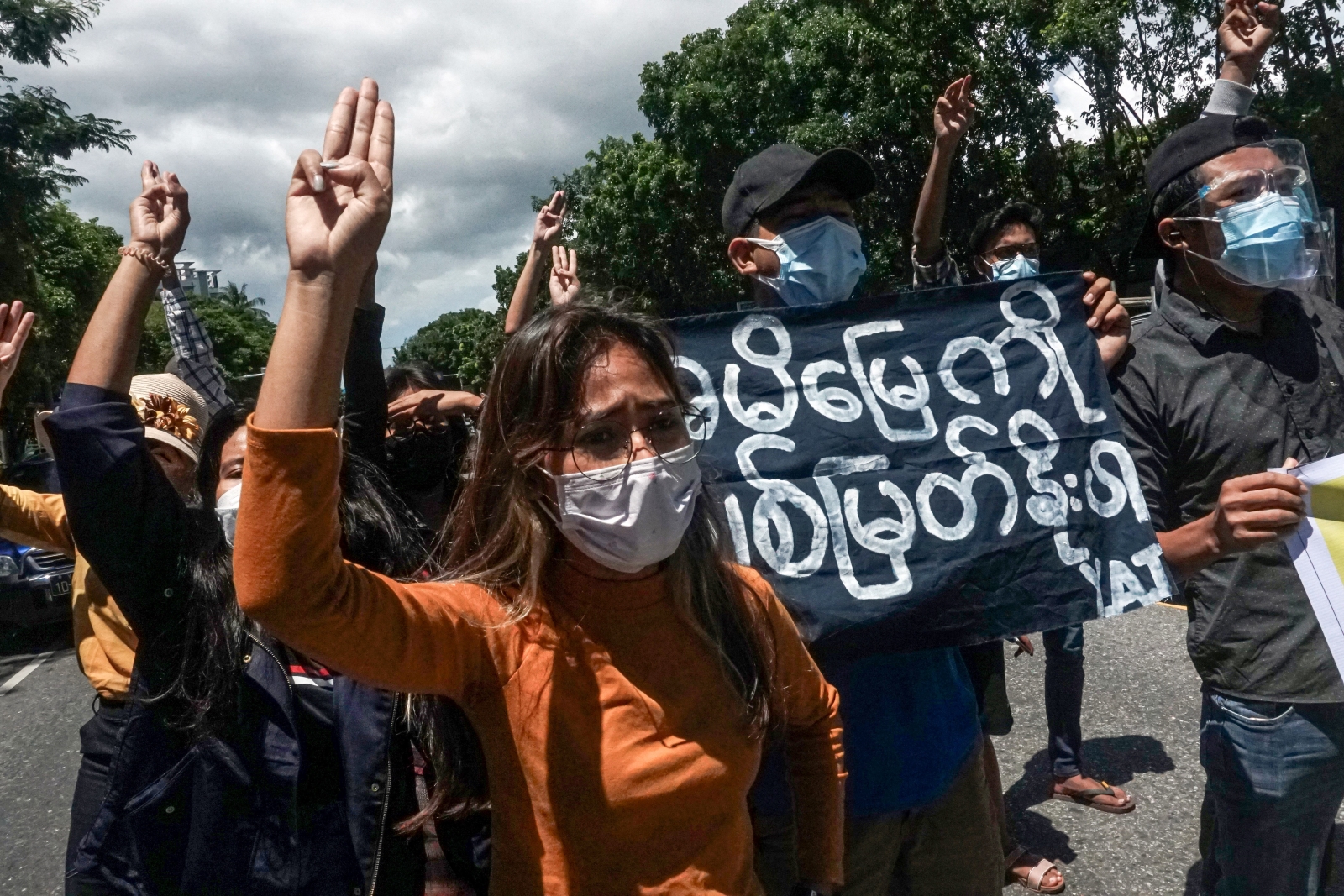 Student activist Lin Lin, then president of Yangon Eastern University Student's Union, leads a demonstration against the military coup in Yangon on August 30, 2021. (AFP)