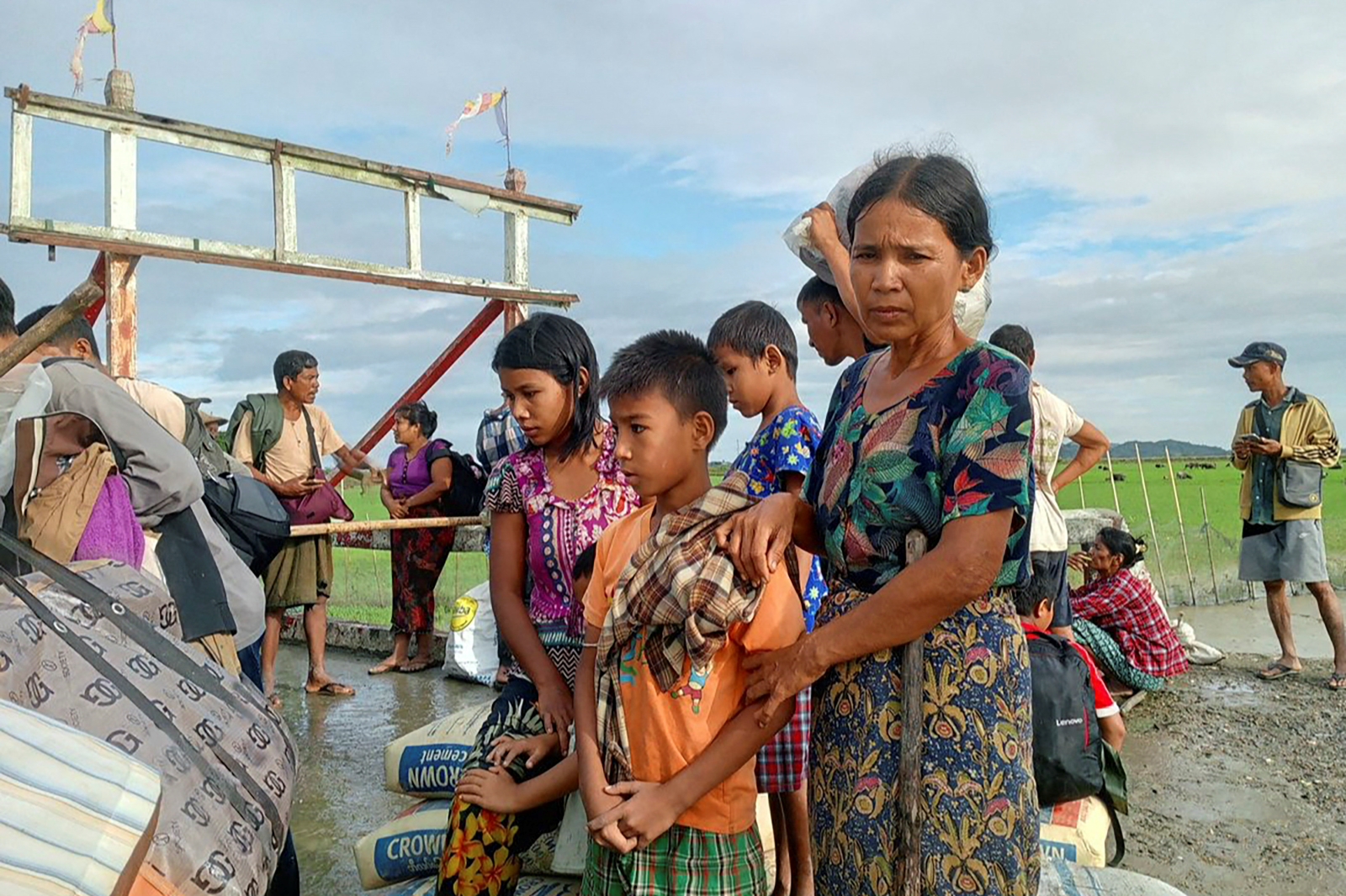 People flee fighting between the military and the Arakan Army in Rakhine State’s Pauktaw Township on November 19, 2023. (AFP)