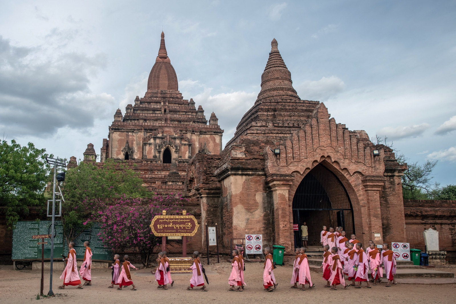 Buddhist novice nuns visit the Sulamani temple in Bagan, in Mandalay Region, on July 8. (AFP)