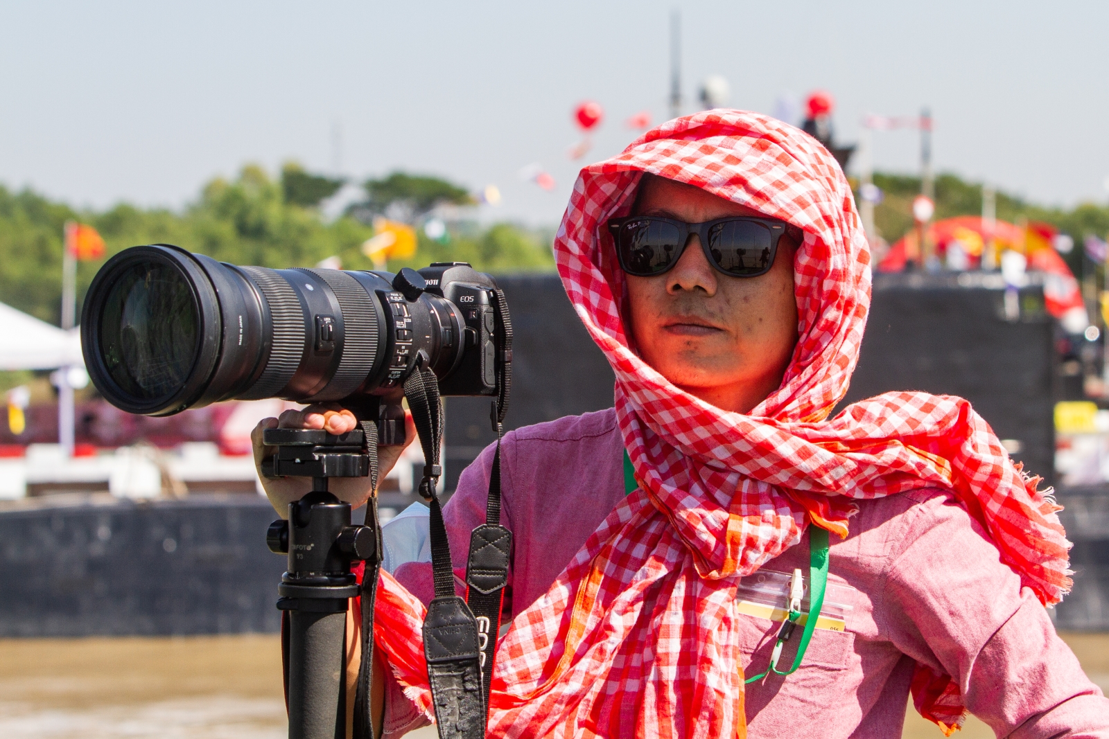 Myanmar journalist Ko Htet Wai covers the Myanmar navy’s commissioning of its first submarine in Yangon in December 2020. (Mar Naw | Frontier)