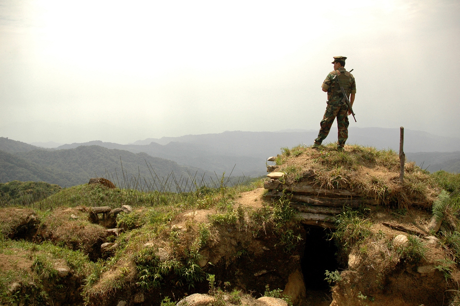 A Kachin Independence Army fighter overlooks a valley in Kachin State in May 2012. (AFP)