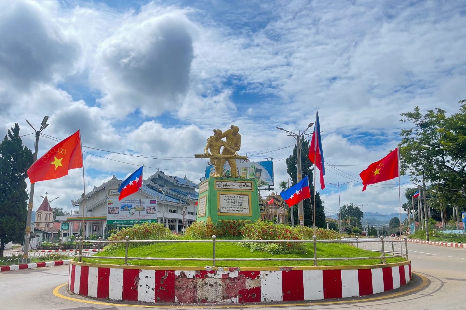 Myanmar National Democratic Alliance Army and Three Brotherhood Alliance flags raised in northern Shan State’s Lashio town on August 10, 2024. (AFP)