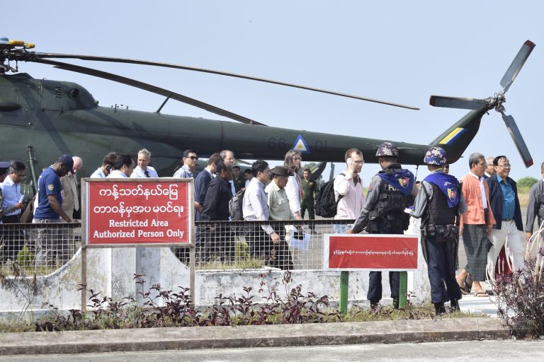 A United Nations Security Council delegation arrives at Sittwe airport in 2018. (AFP)