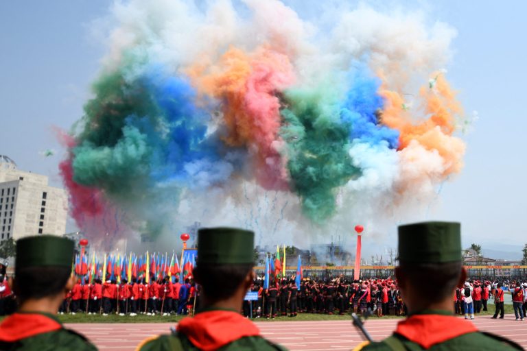 Fireworks go off during a military parade, to commemorate 30 years of a ceasefire signed with the Myanmar military in the Wa State, in Panghsang on April 17, 2019. (AFP)