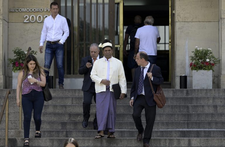 The President of The Burmese Rohingya Organisation UK , Tun Khin (L) and Argentine human rights lawyer Tomas Ojea Quintana (R) leave Argentine federal court in Buenos Aires on November 13, 2019. (AFP)