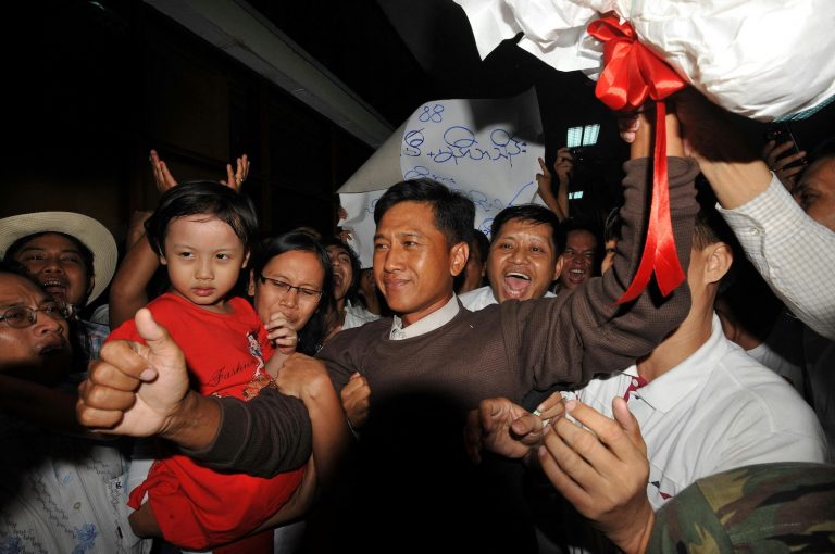Ko Jimmy celebrates with his family after being released from prison in 2012. (AFP)